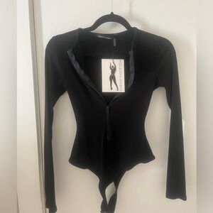 NAKED WARDROBE NEW snatched zip front long sleeve ribbed bodysuit-Black